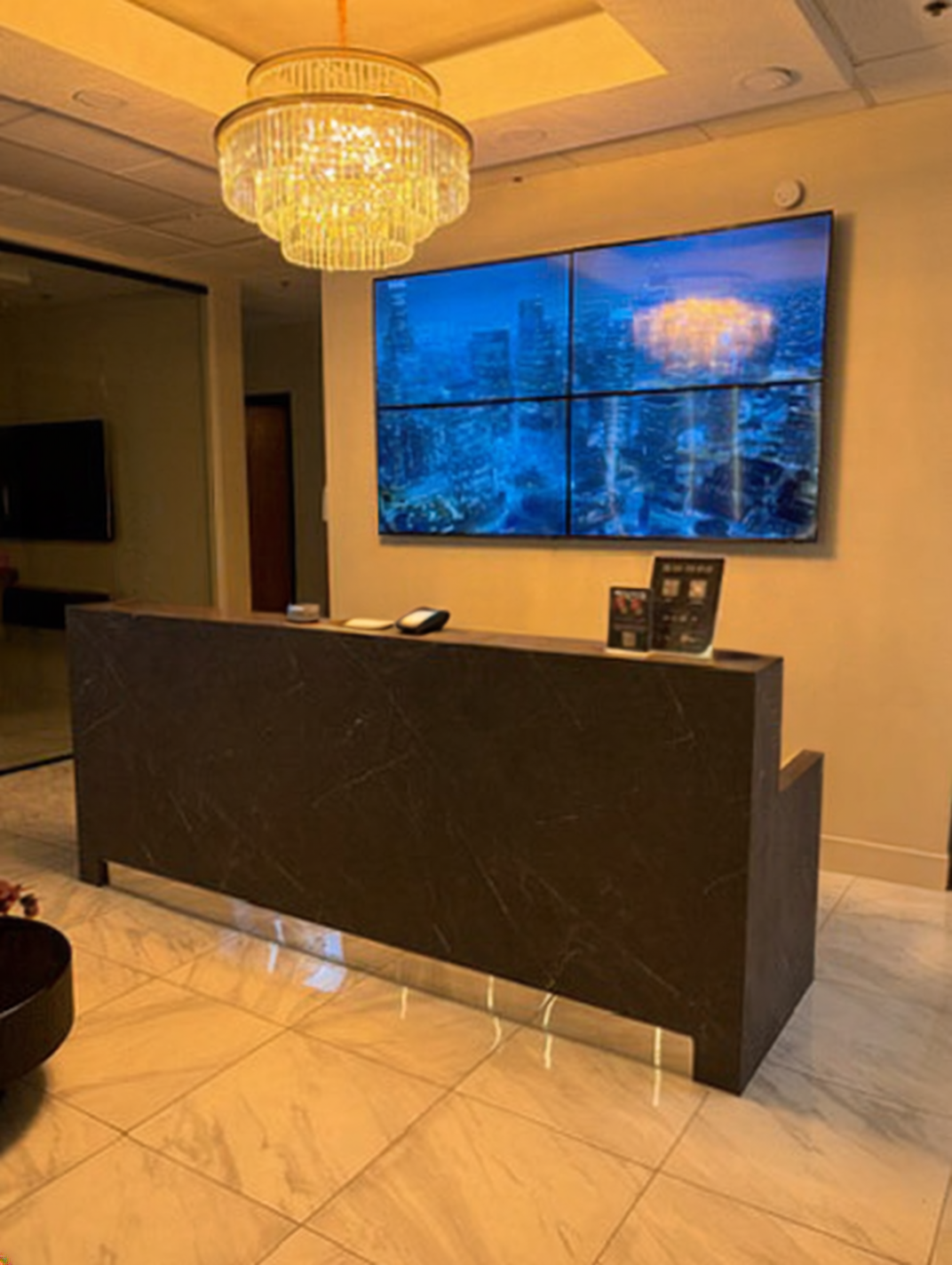 Flawless Lab Scottsdale reception desk completed in dark stone Bodaq architectural film