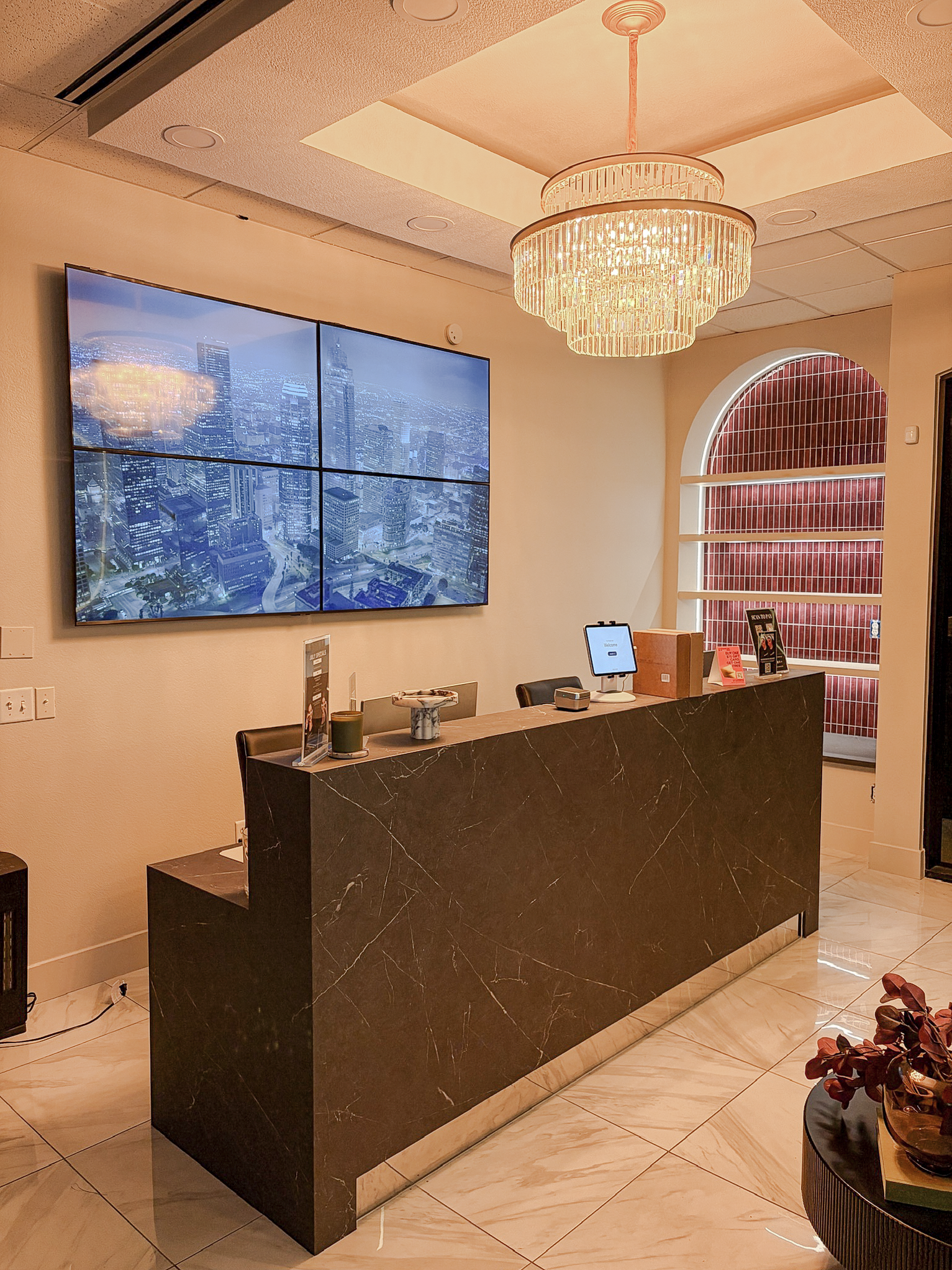 Scottsdale commercial reception desk completed in Bodaq PM007 dark stone architectural film
